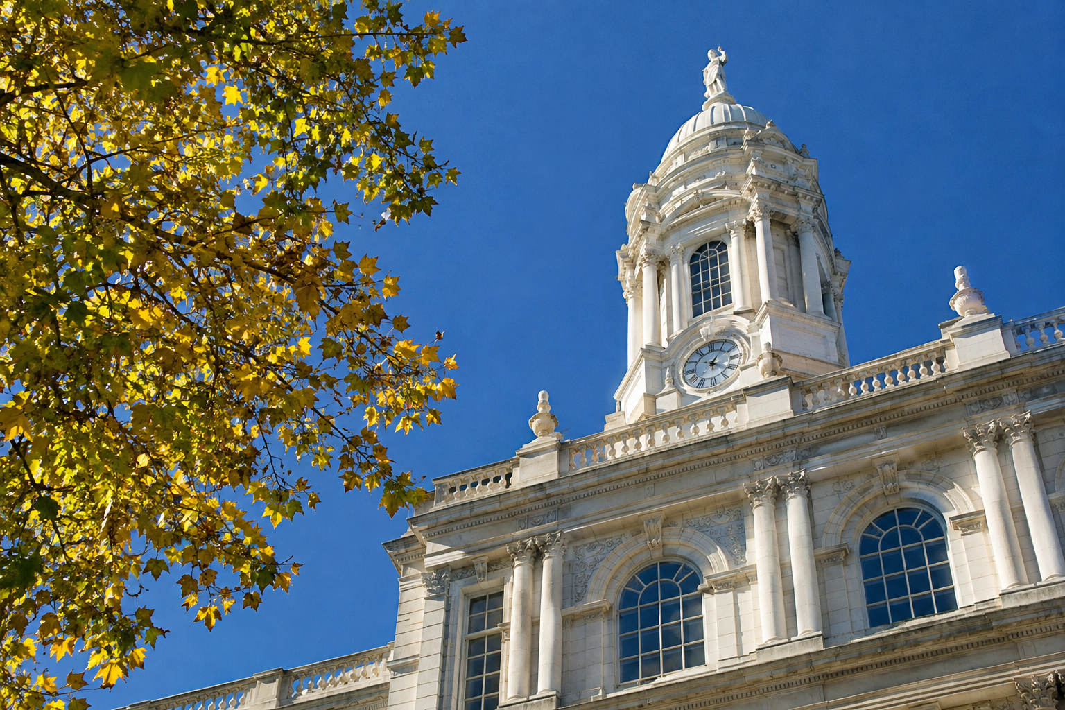 New York City Hall cupola against a clear blue sky
